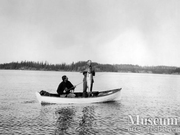 Herbert Pidcock and Dr. Wiborn in clinker-built boat