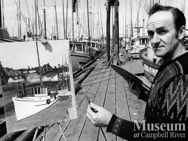 Artist George Borgford painting at the government wharf, Campbell River