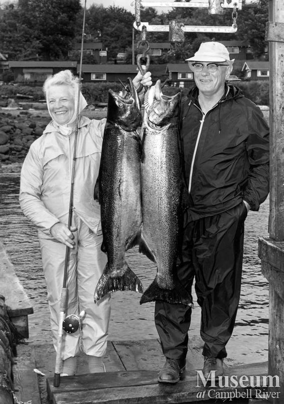 Mrs. Irvin McChesney with her catch of two fish