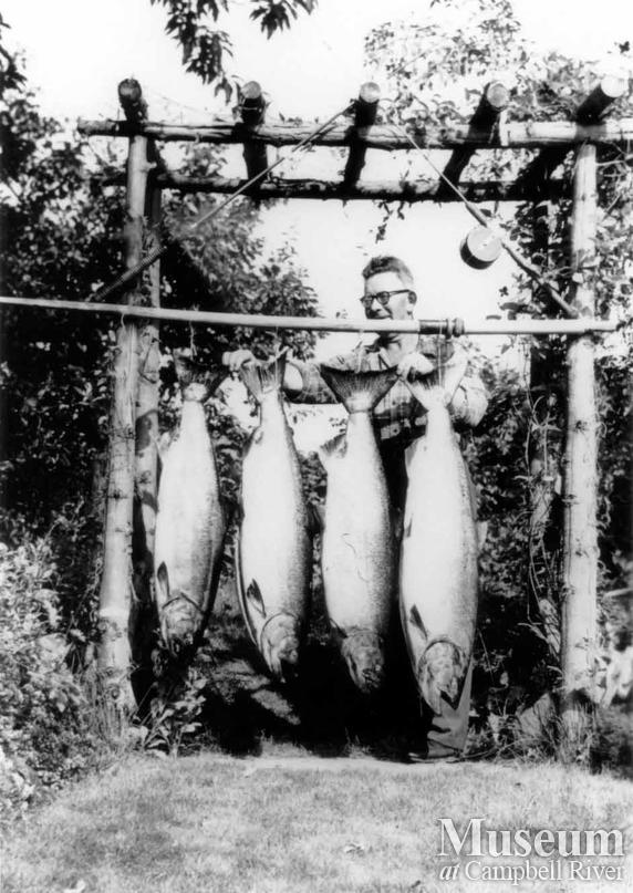 Einar Anderson with four fish