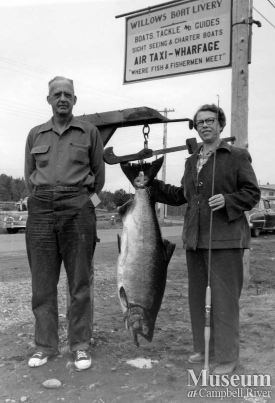 Two anglers at the Willows Hotel scale