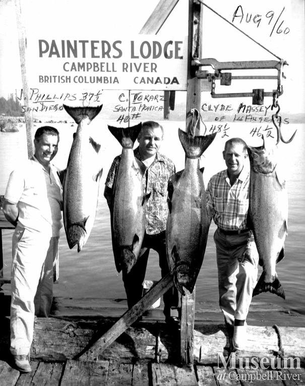 Group of anglers with their respective catches