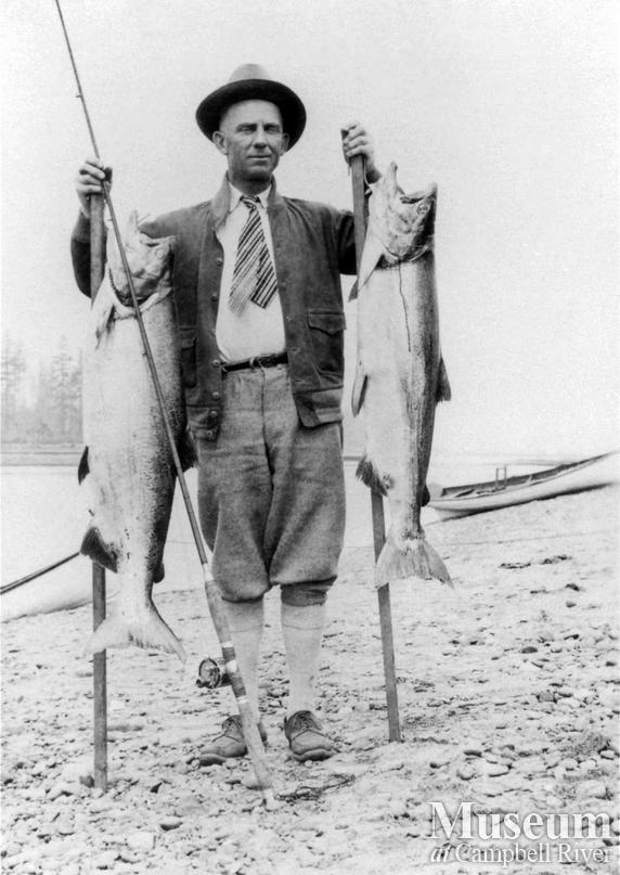 Unknown angler with two fish