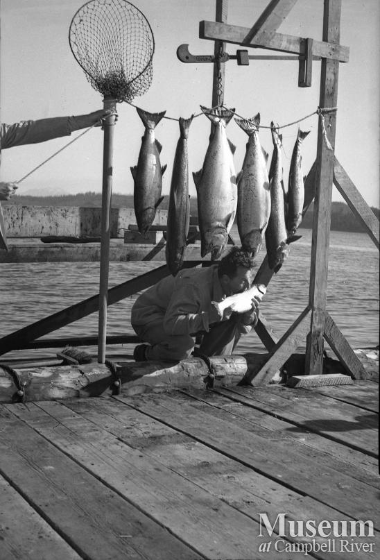 Guest with catch of salmon at Painter's Lodge